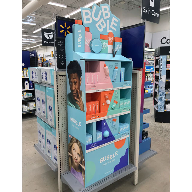 Bubble Display Faces The Day - Point of Purchase International Network